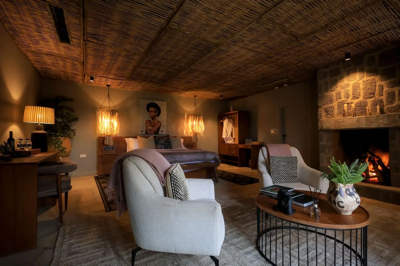 Guest suite bedroom and sitting area at Sambora Kinigi